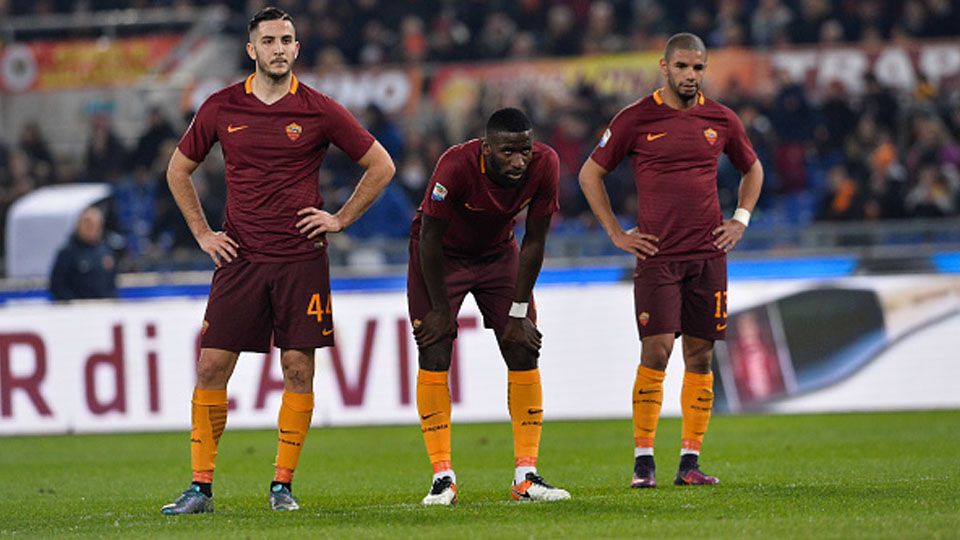 kiri-kanan: Kostas Manolas, Antonio Rudiger, dan Bruno Peres. Copyright: Silvia Lore/NurPhoto via Getty Images